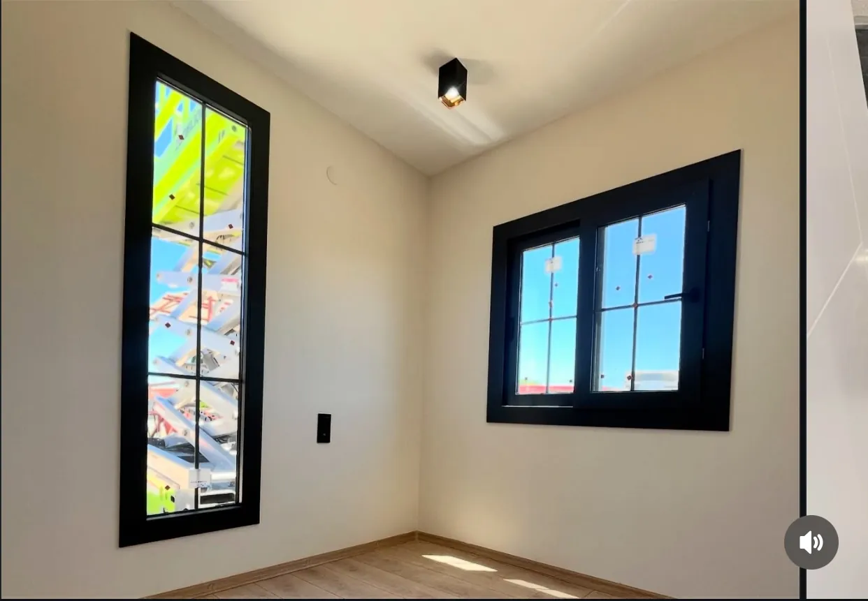 40ft container home room with double-pane black-frame windows