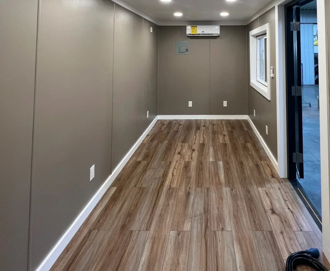 20ft modified office container finished interior with wood-look laminate floor