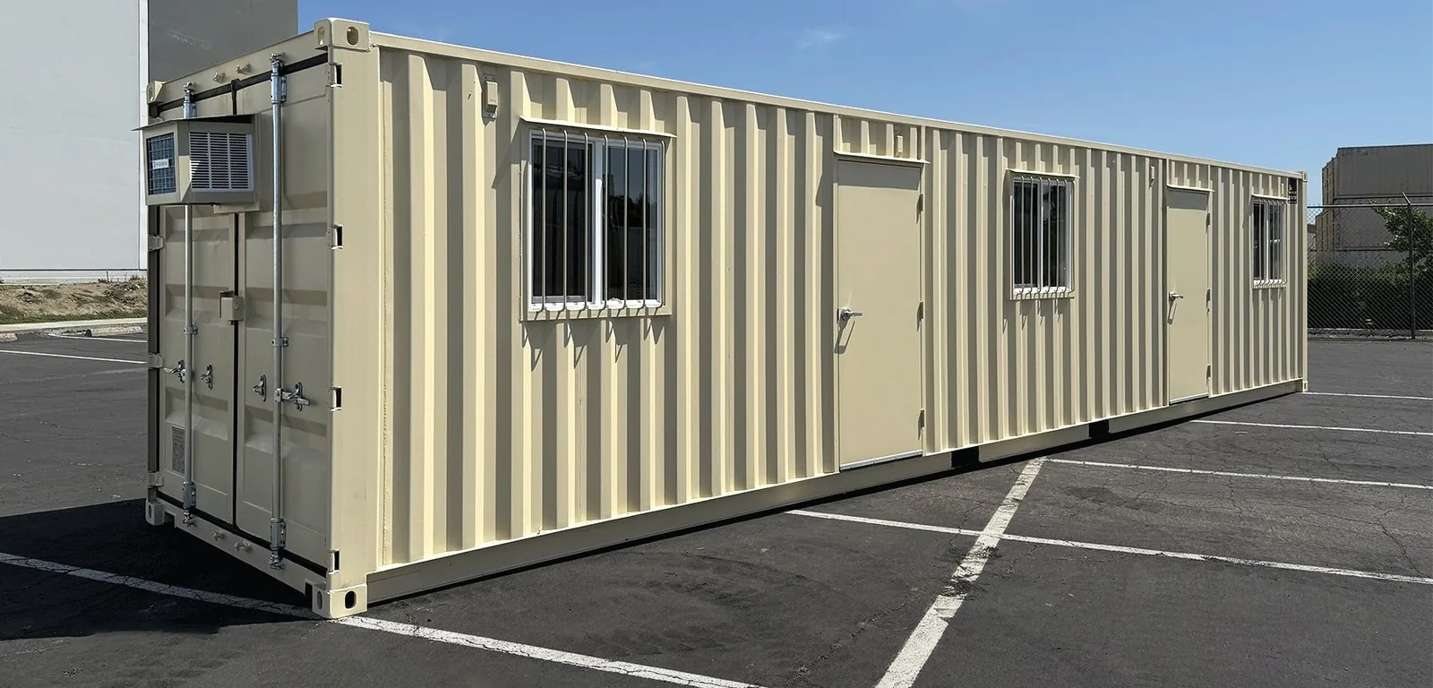 40ft Corten office container angled view with barred windows and cargo doors